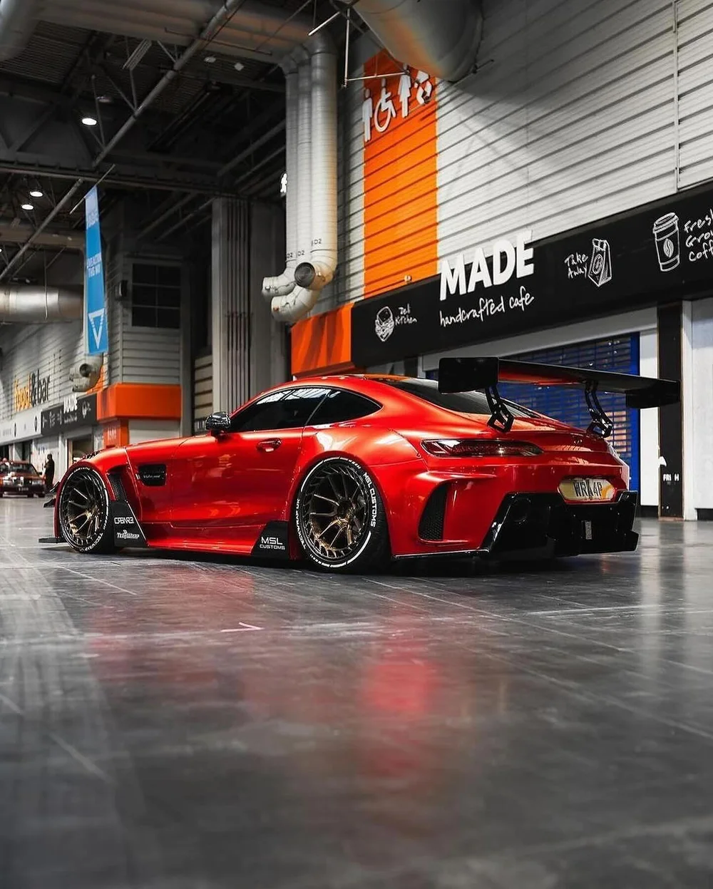Rear three-quarter of the AMG GT with GT wing