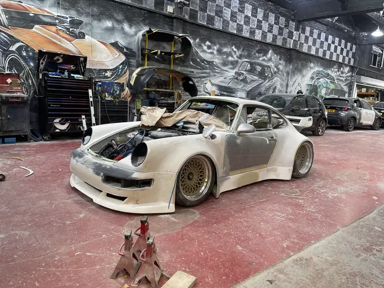 The 911 in primer, mid-restoration